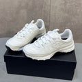 CHANEL 26S RUNNER CC LOGO SNEAKERS IN WHITE CALFSKIN